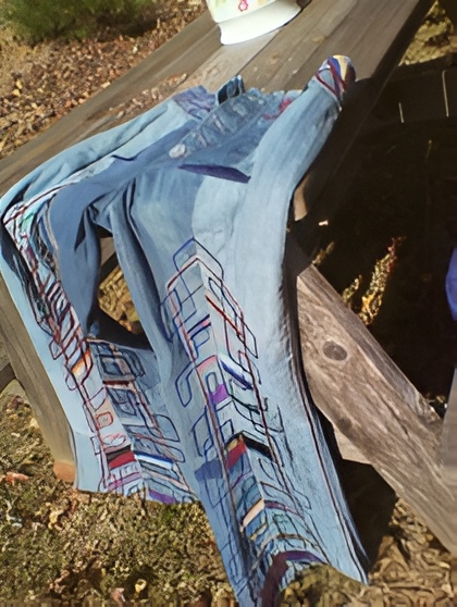 Artistic jeans on picnic table