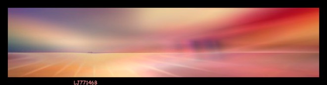 Vibrant sunset sky over calm ocean.